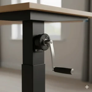 Close-up of a smooth-action hand crank on an affordable manual sit-stand desk, focusing on the mechanical detail.