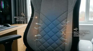 Close-up of breathable air-mesh material on a gaming chair backrest with multi-directional ventilation channels for cooling.