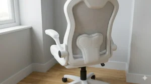 Close-up of lumbar support on a white faux leather gaming chair for narrow workstations.