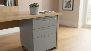 A grey 3-drawer filing cabinet tucked neatly under a wooden desk in a contemporary home office.