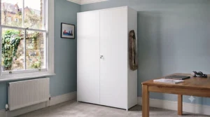 Minimalist white tall storage cabinet for an office, blending seamlessly into a bright, contemporary workspace.
